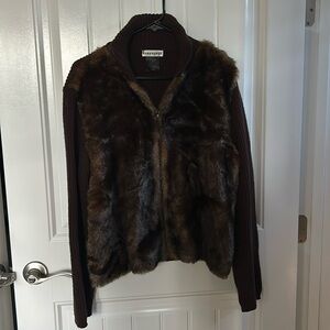 Women’s Sweater size medium with fur front with zipper.